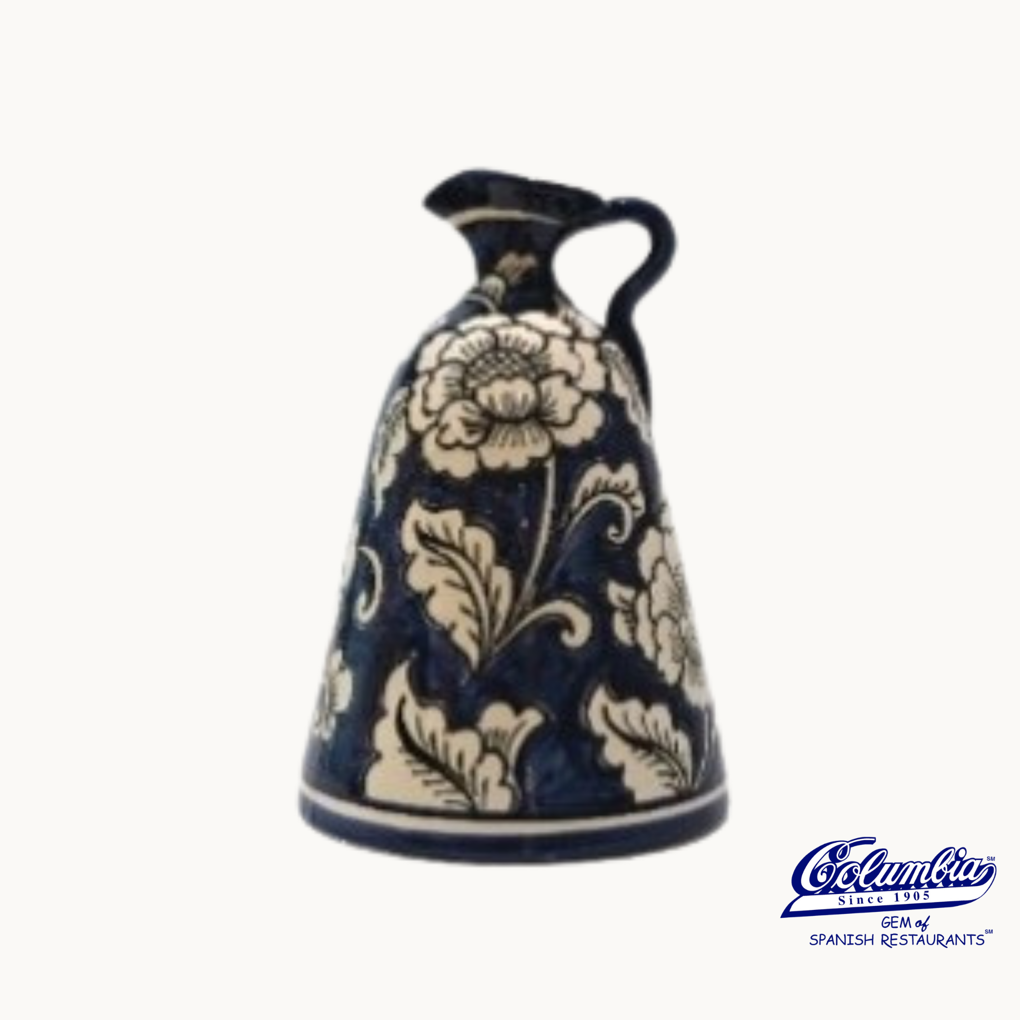 Decorative blue and white ceramic bell on a white background