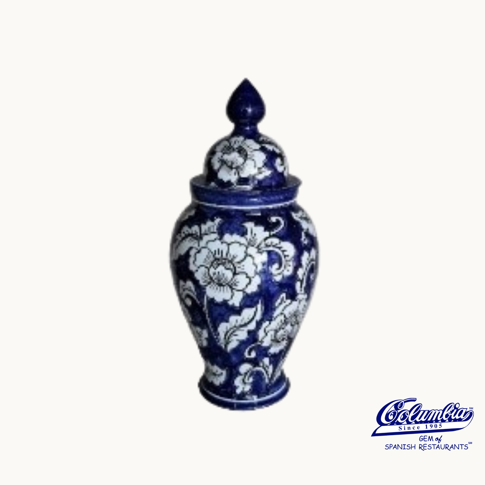 Blue and white ceramic jar with floral patterns on a white background