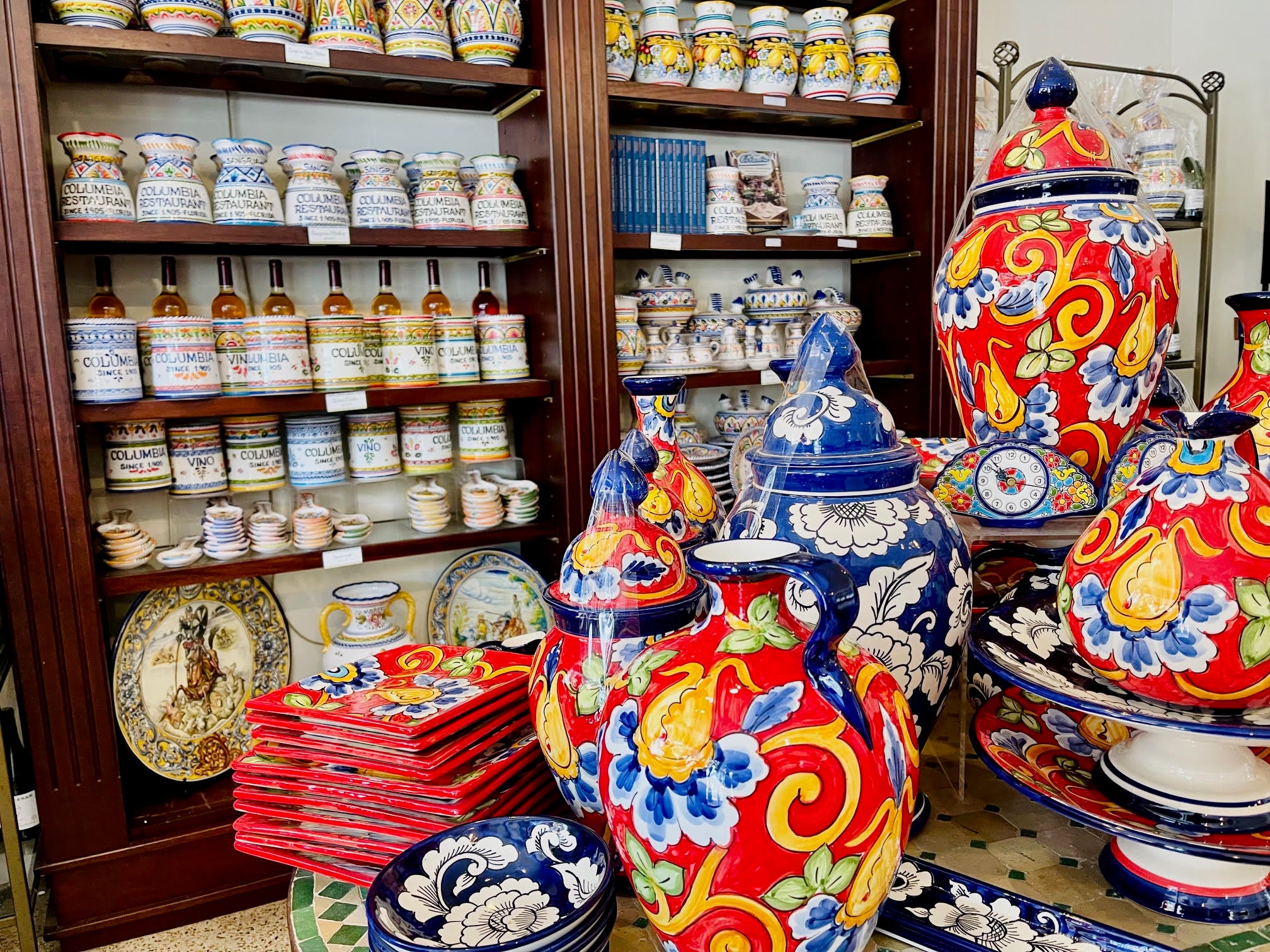 Blue and Red Spanish Ceramic Pottery on a Table