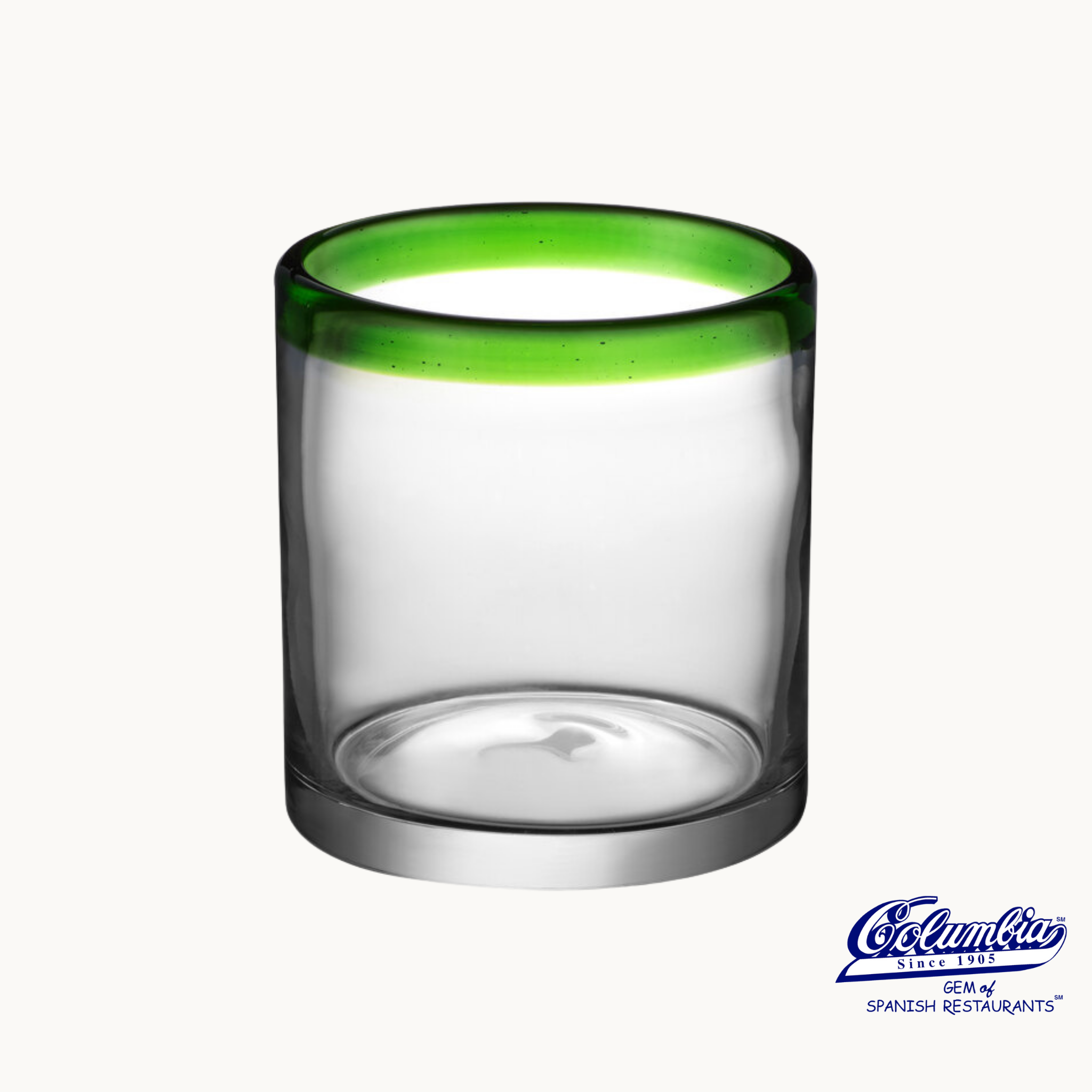 A small mojito glass with a green rim on a white background, with the Columbia brand logo visible watermark