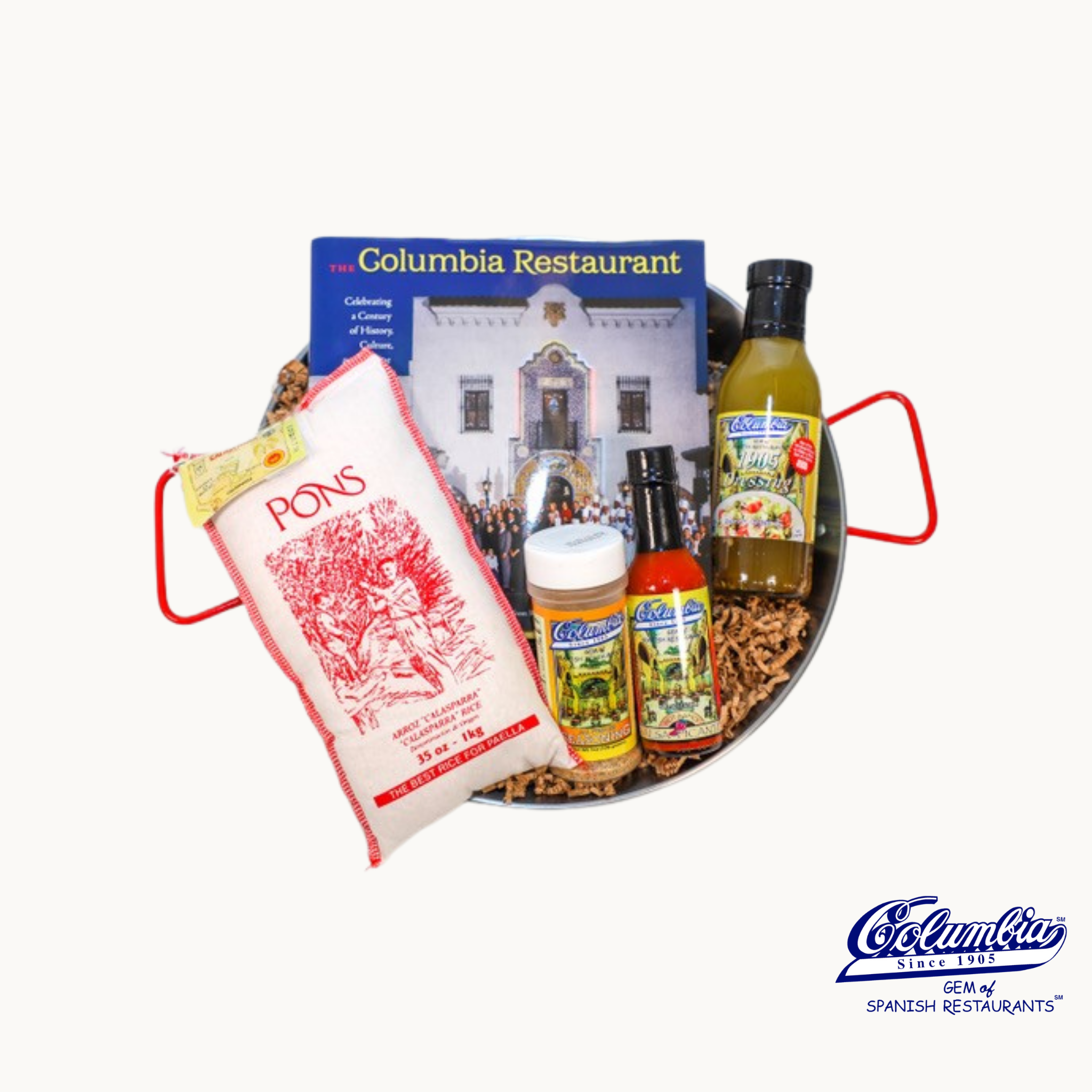 Collection of Spanish restaurant items including pollo, sauces, and a restaurant guide in a metal tray.