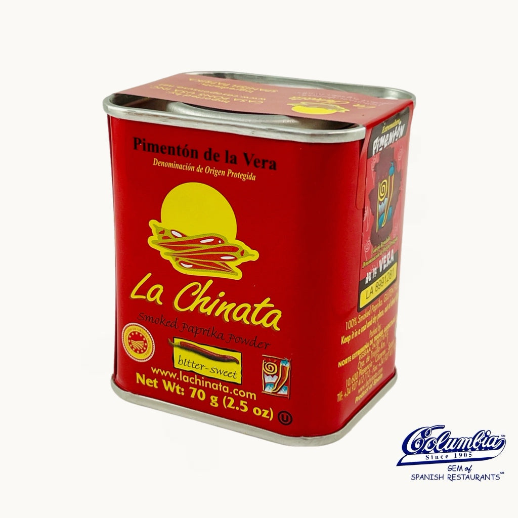 Red can of La Chinata pimentón de la Vera on a white background