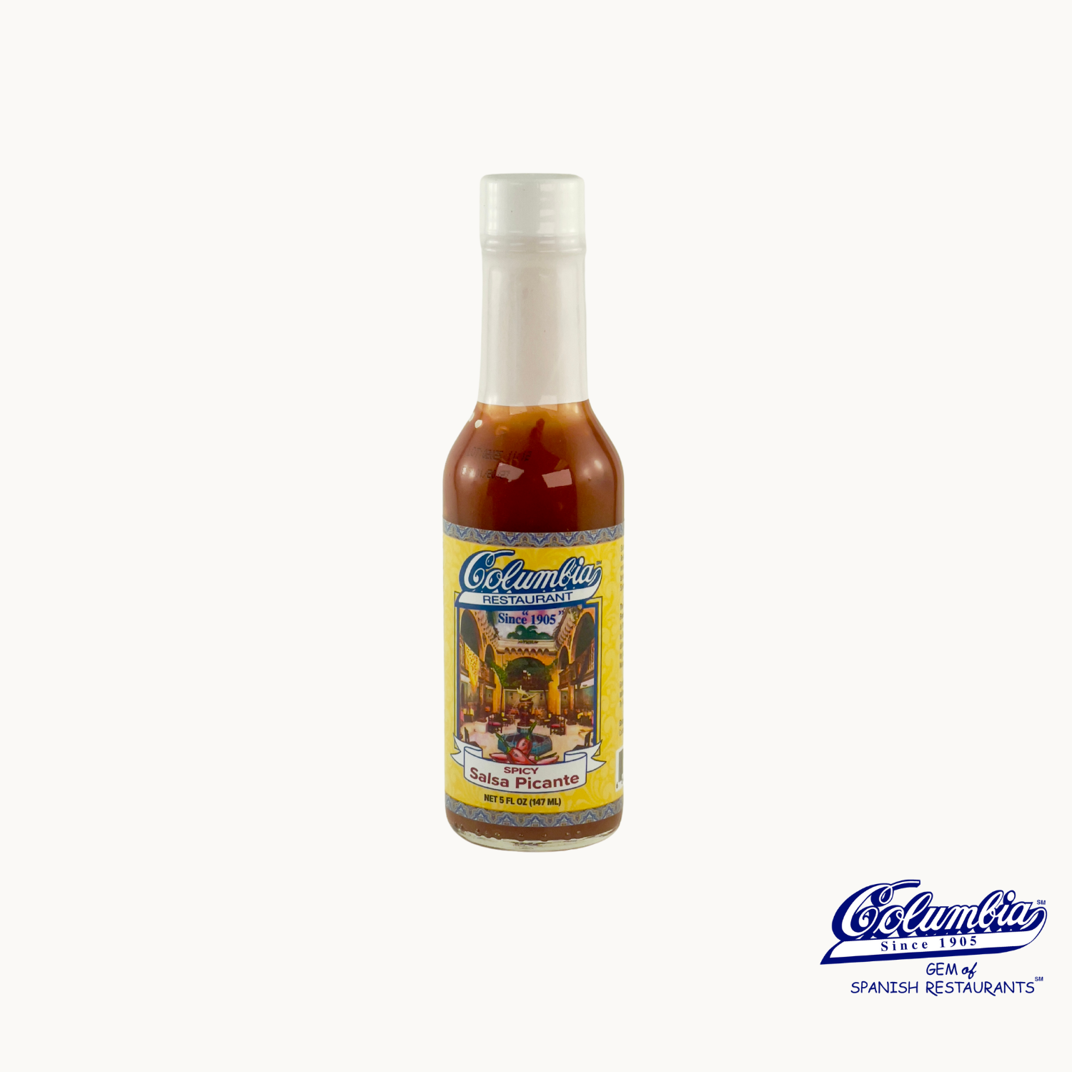 A bottle of Columbia Salsa Picante Hot Sauce with a label showing the brand name and product name.