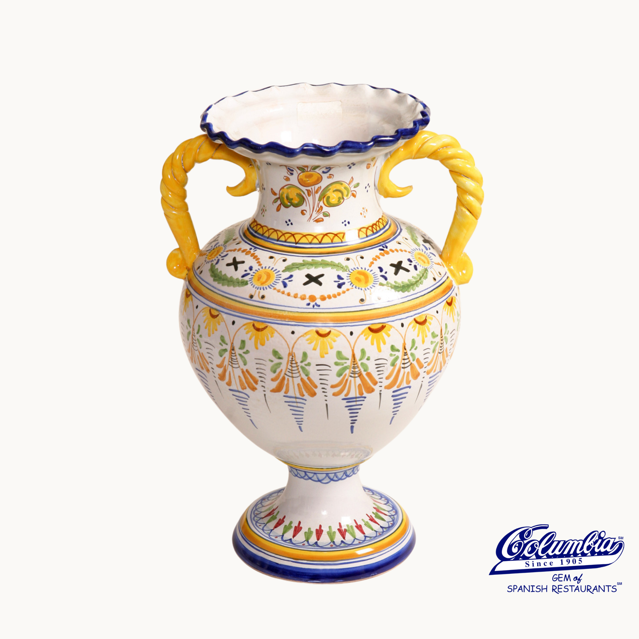 Decorative ceramic vase with colorful patterns on a white background