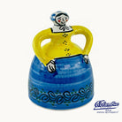 Ceramic jar with a decorative design on a white background