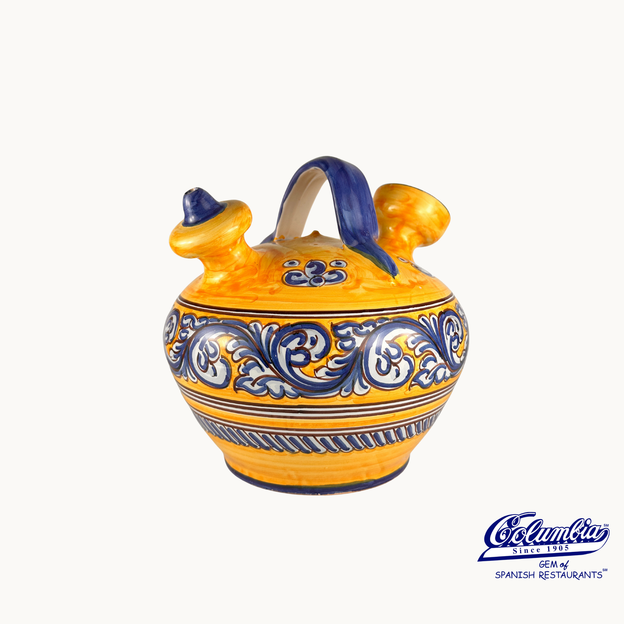 Decorative ceramic jar with blue and white patterns on a white background, featuring the Columba brand.