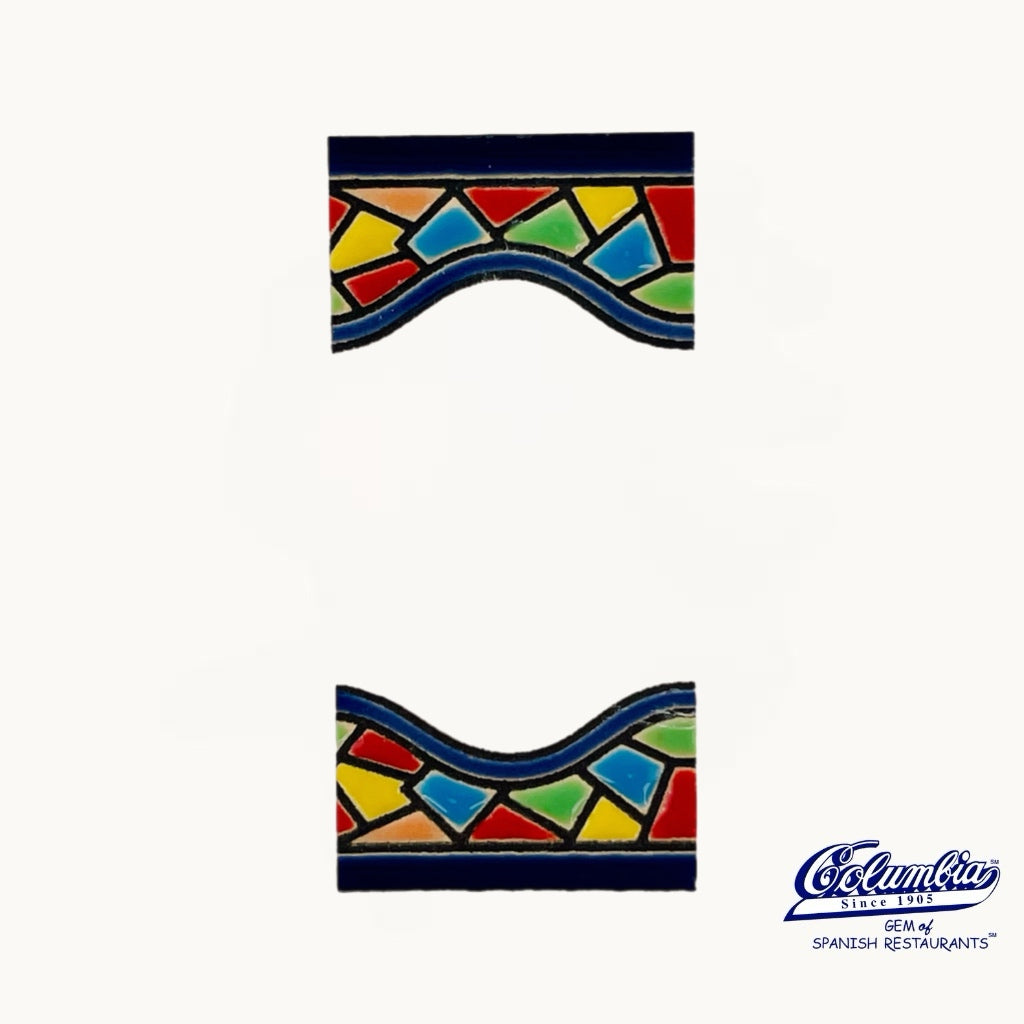 Decorative tile with colorful geometric pattern on a white background, featuring the Columba logo.