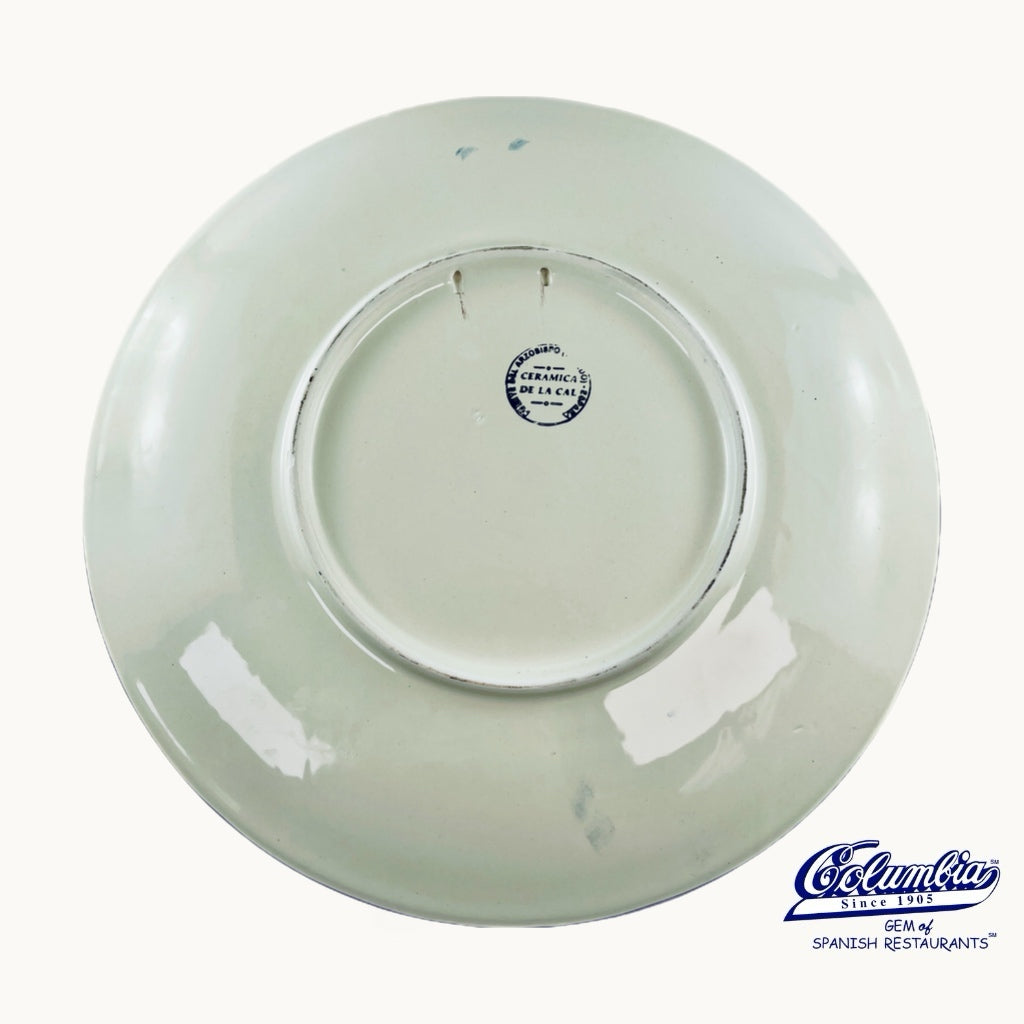 Ceramic plate with a visible brand logo on a white background