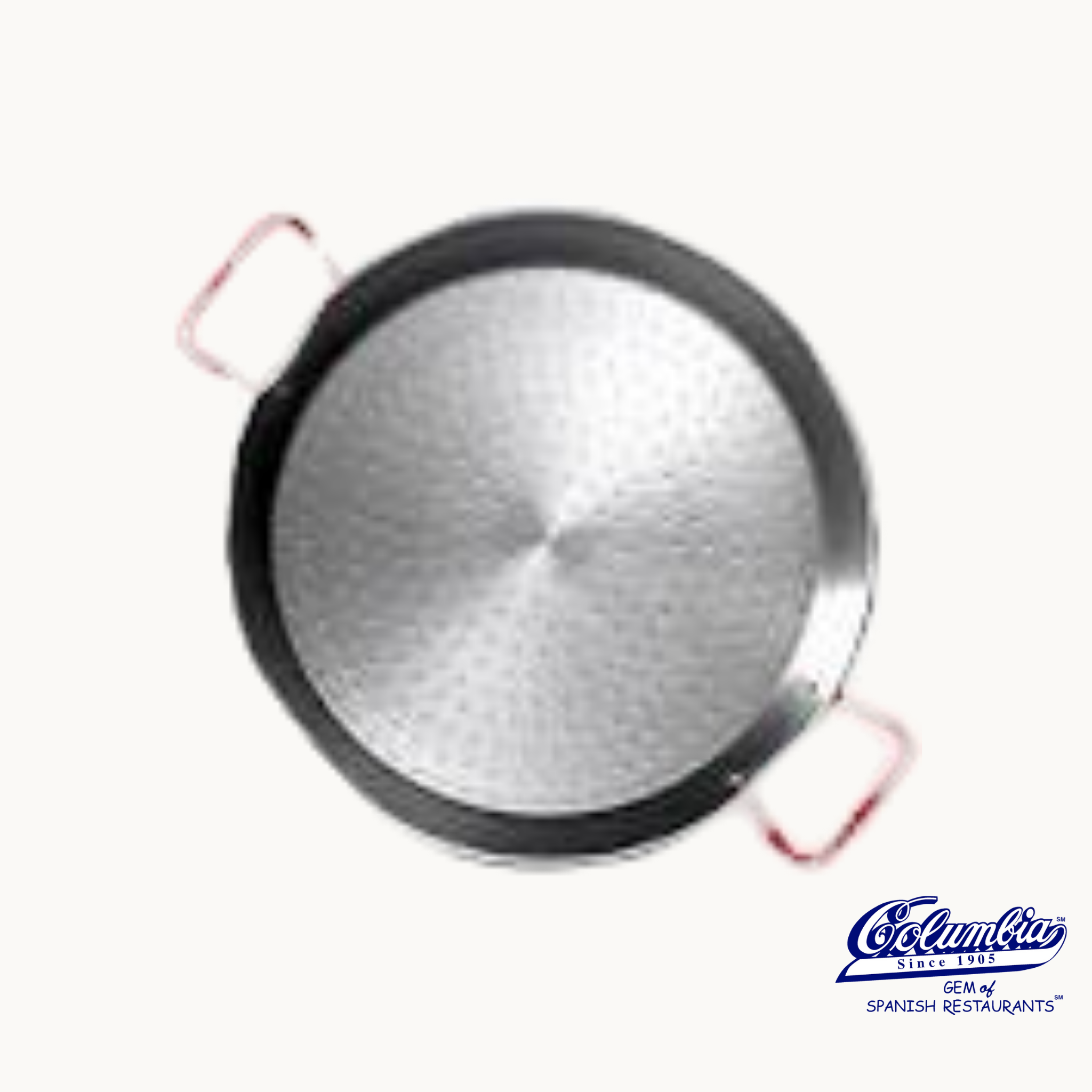 A 22 cm carbon steel paella pan with a metallic finish and side handles.