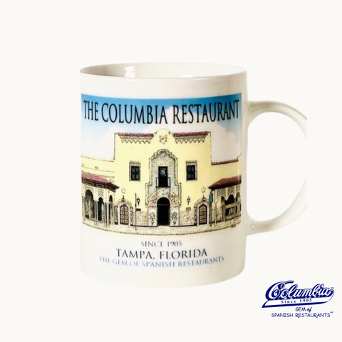 Mug with a restaurant facade and text on a white background