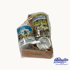 A packaged product including a wooden cigar box, a coffee mug, a can of ground coffee, a ceramic dish, and a postcard, all branded with the Columbia Restaurant logo.
