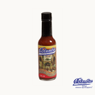 Bottle of salsa with a colorful label on a white background