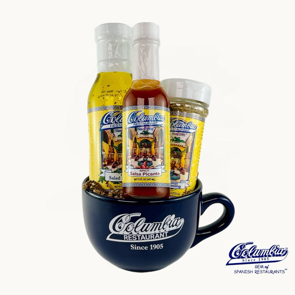 Columbus Restaurant condiment set with a blue mug on a white background