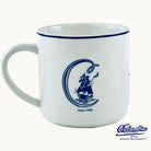 White Coffee Mug with C and a ship in it. on white background