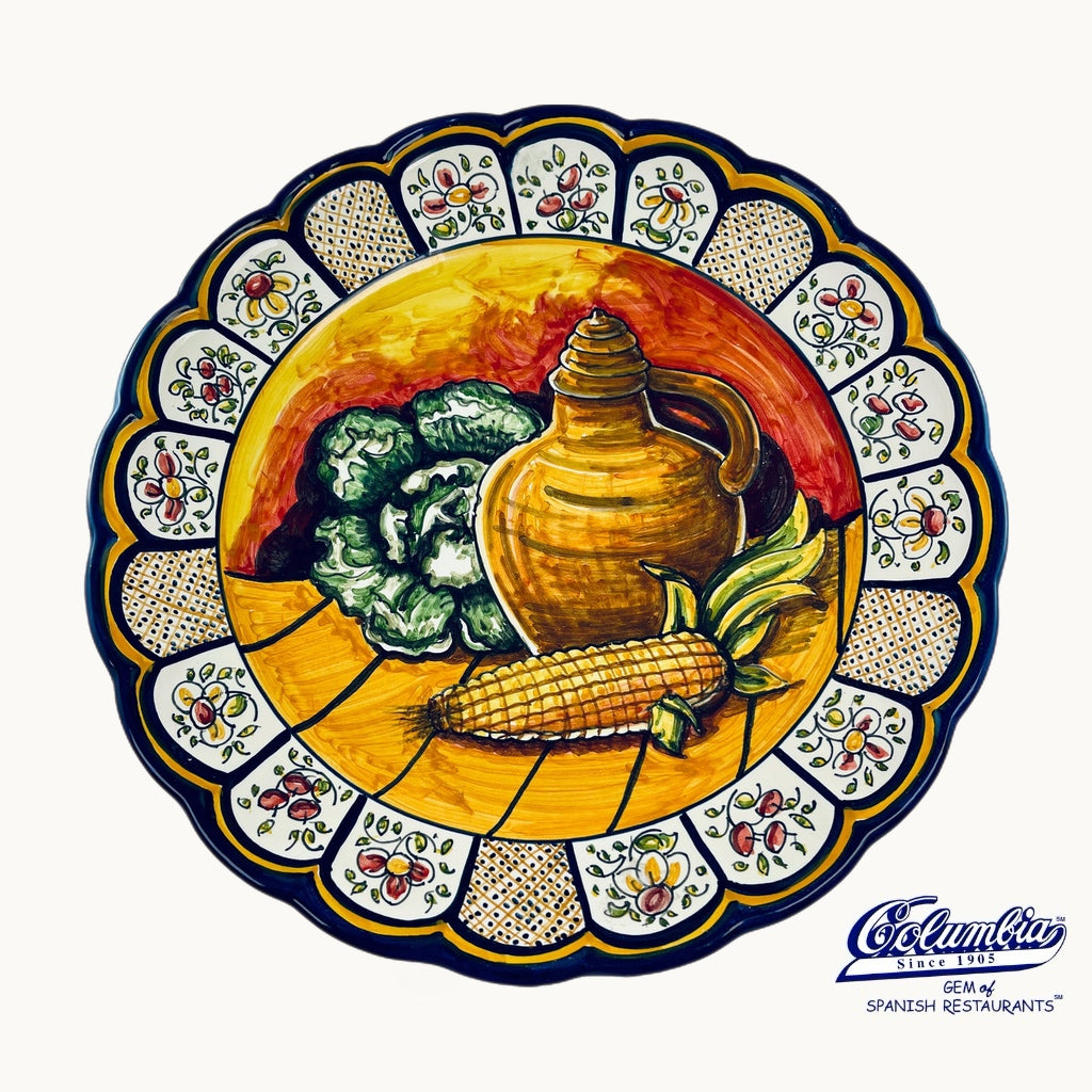 Decorative plate with corn and lettuce on it