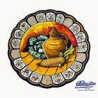 Decorative plate with corn and lettuce on it