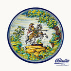 Decorative Plate with a man on a horse with a sword in a forrest. 