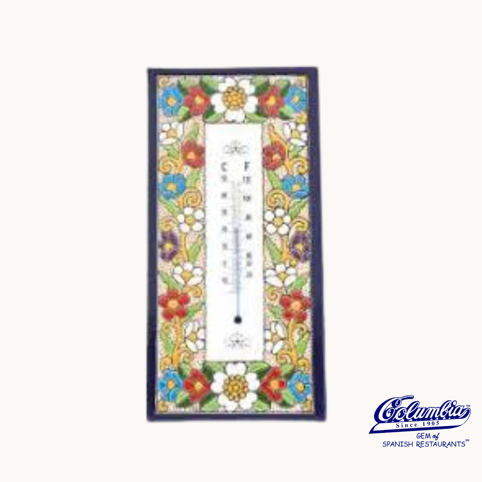 Decorative thermometer with floral design on a white background