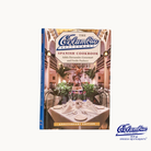 Cover of 'The Columbia Restaurant Spanish Cookbook” Anniversary Edition featuring an indoor dining scene at the Columbia Restaurant.