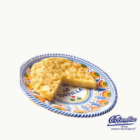 Spanish omelette on a decorative Spanish plate.
