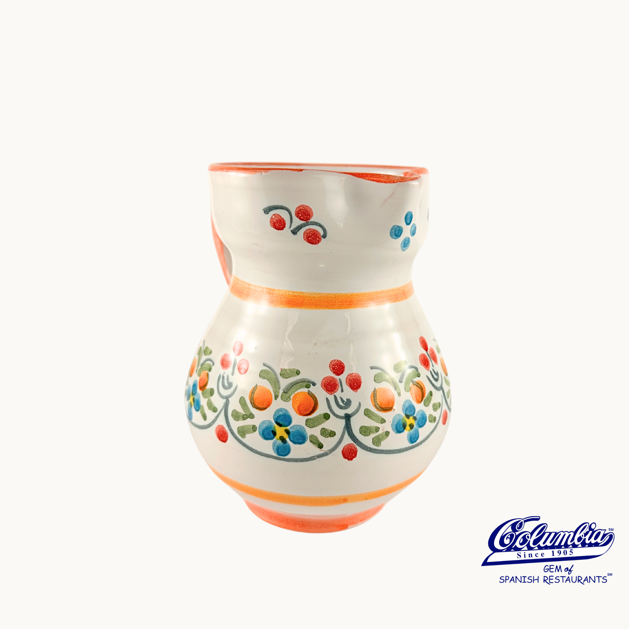 Ceramic vase with colorful floral patterns on a white background, featuring the Columba brand.