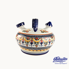 Decorative ceramic pot with colorful patterns on a white background, featuring the Columba brand.
