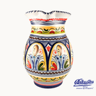 Colorful ceramic vase with decorative patterns on a white background, featuring the Columba brand.