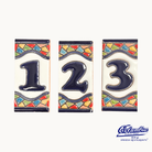 Three ceramic tiles with numbers 1, 2, and 3 on a white background, featuring a colorful border.